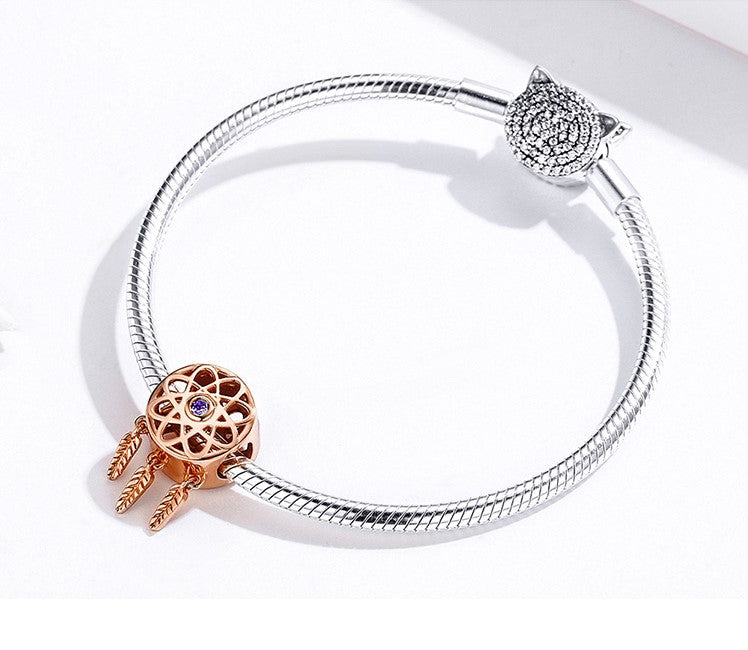 Gold and silver charms bracelet in 92.5 sterling silver Rose Gold